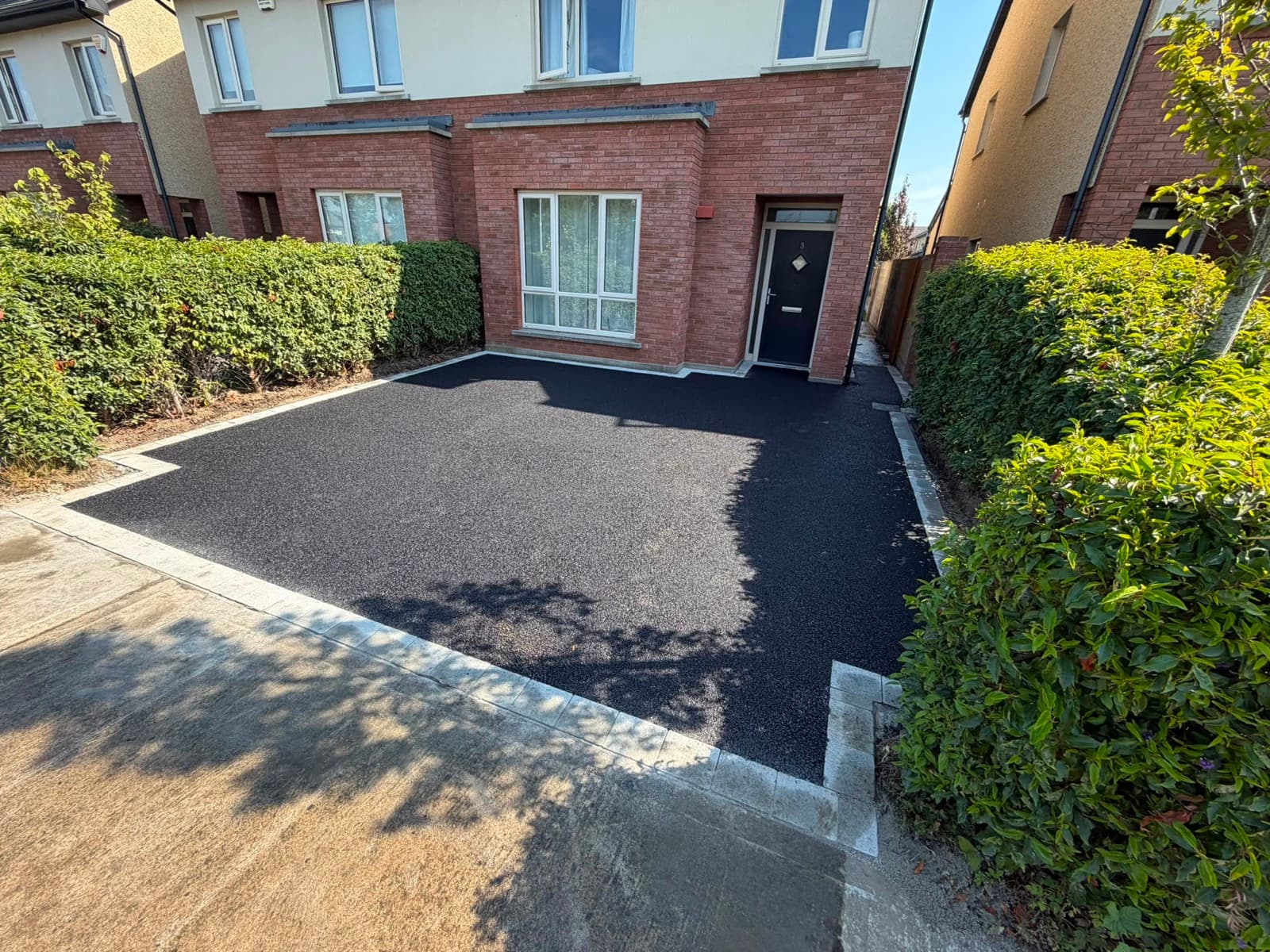 Artificial lawn laid up to existing patio